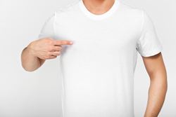 How does gynecomastia affect boys and men at different ages?