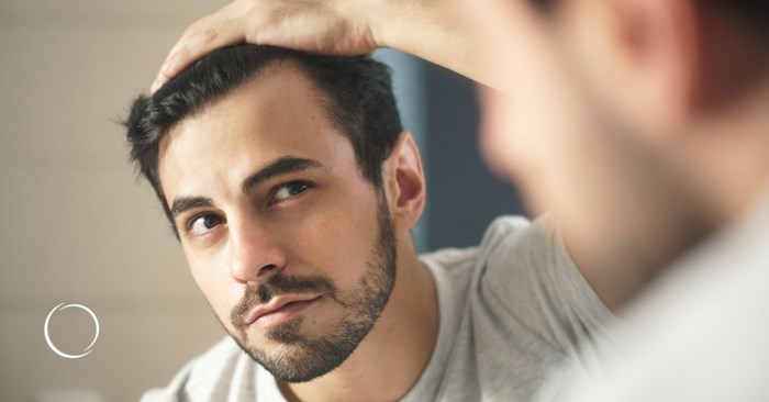 addressing male pattern baldness with hair restoration