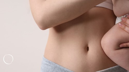 How can a tummy tuck help with separated abdominal muscles?
